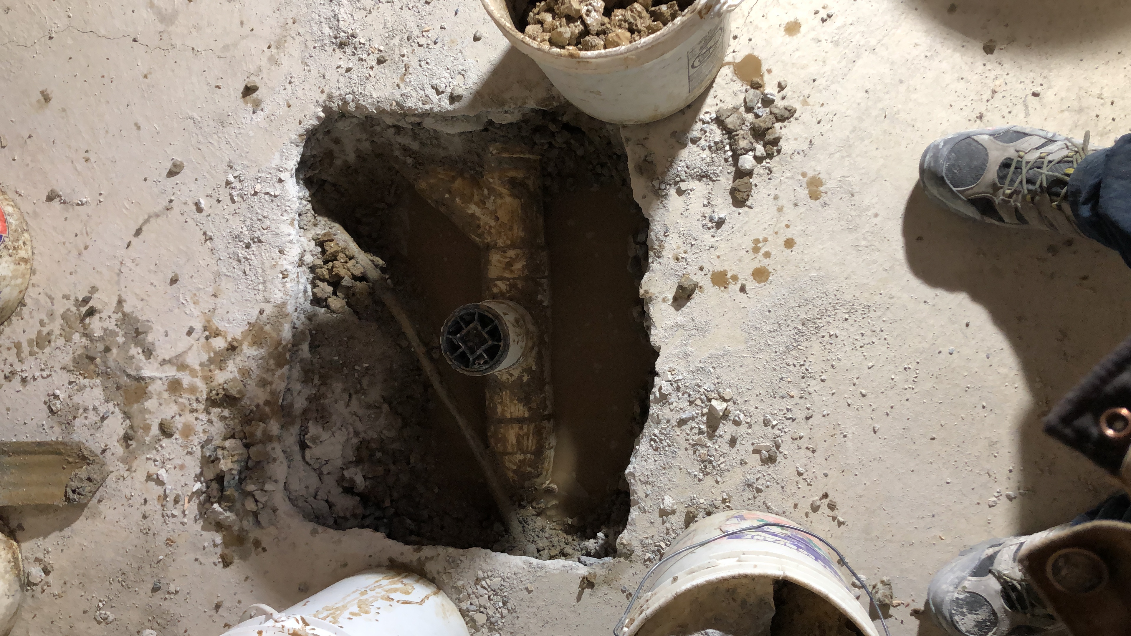 Floor excavation for drain installation
