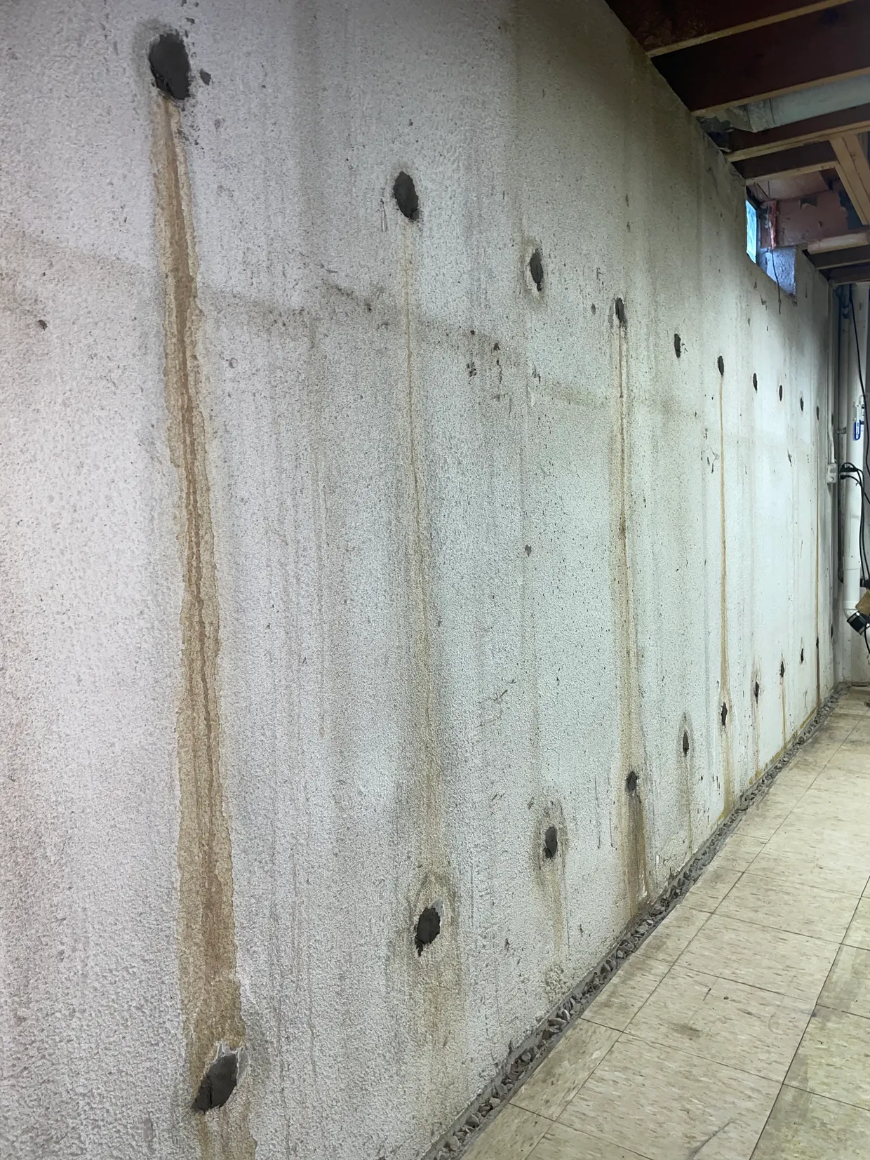 Poured foundation rod holes