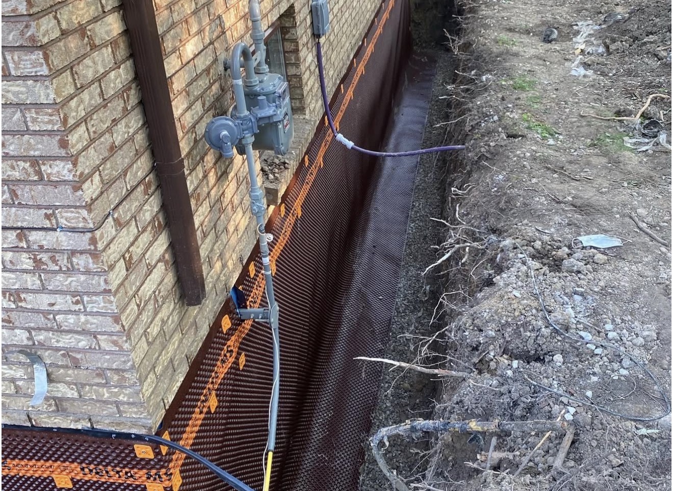 Exterior waterproofing membrane installation