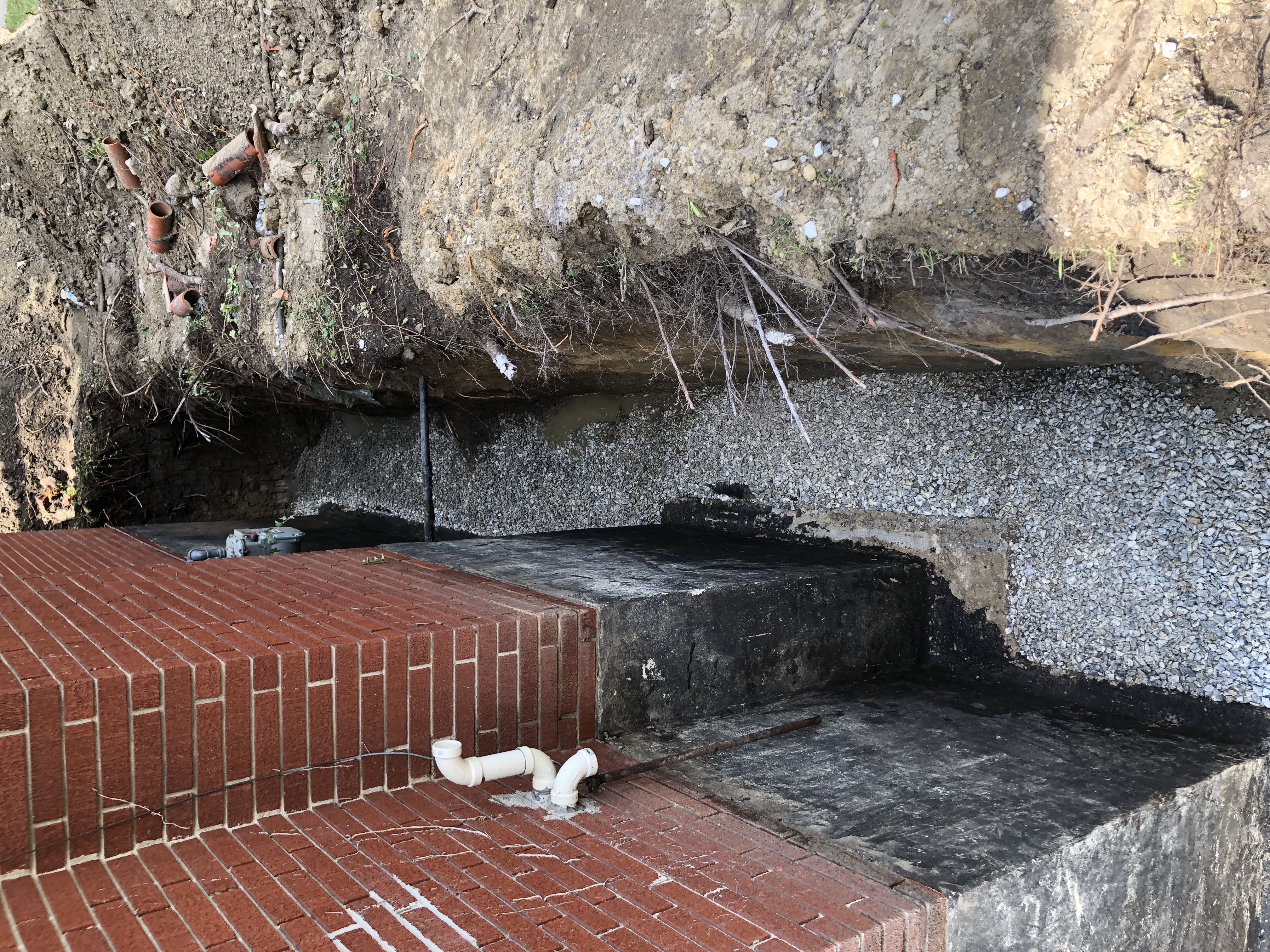 Exterior waterproofing with gravel drainage