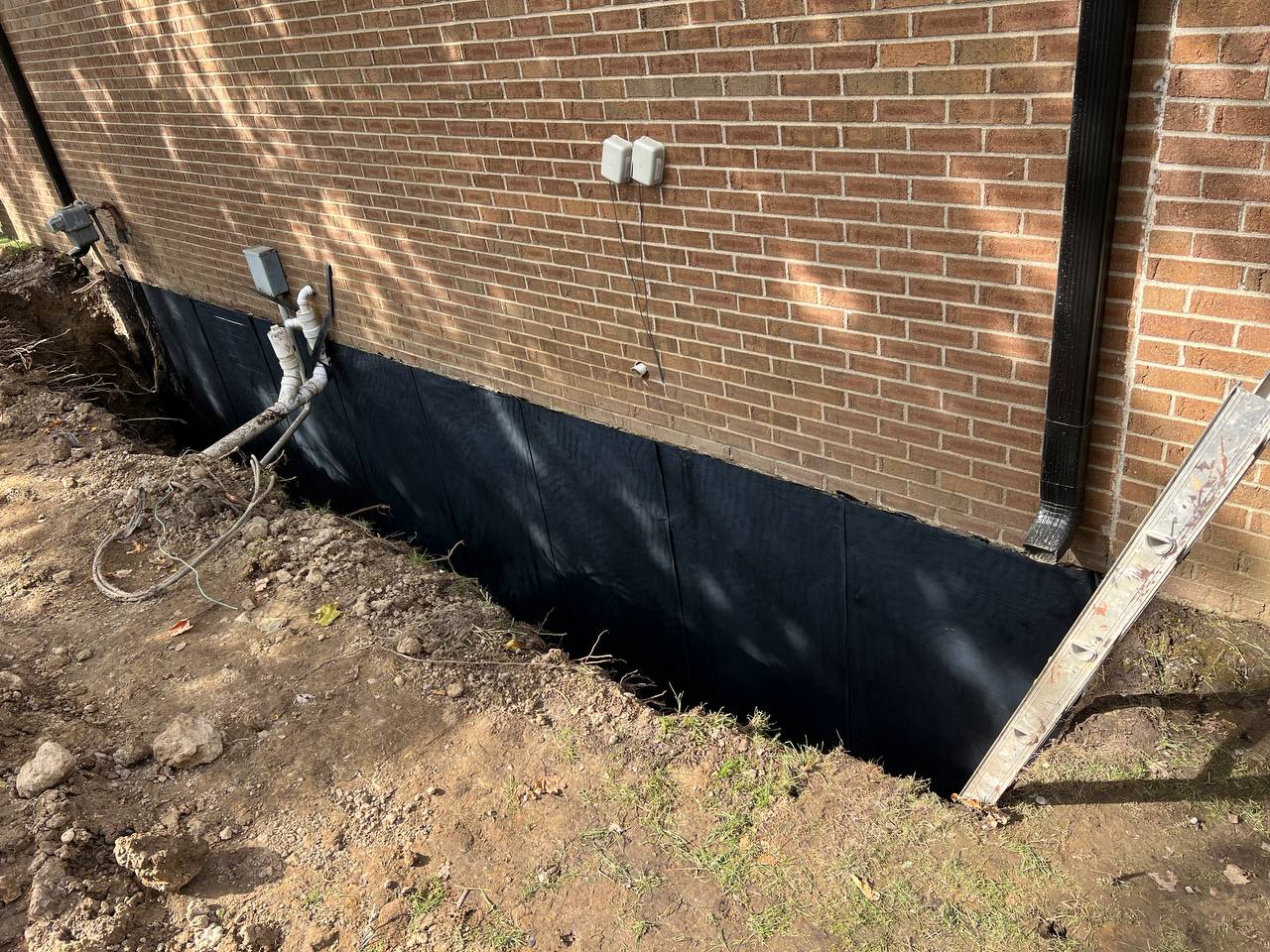Exterior waterproofing sealant and adhesive application