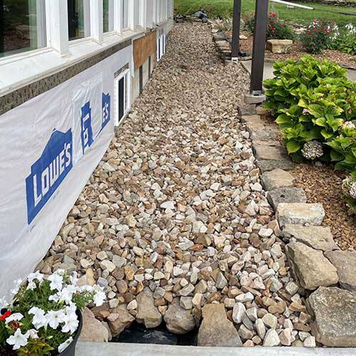Exterior drainage project ready for backfill and restoration